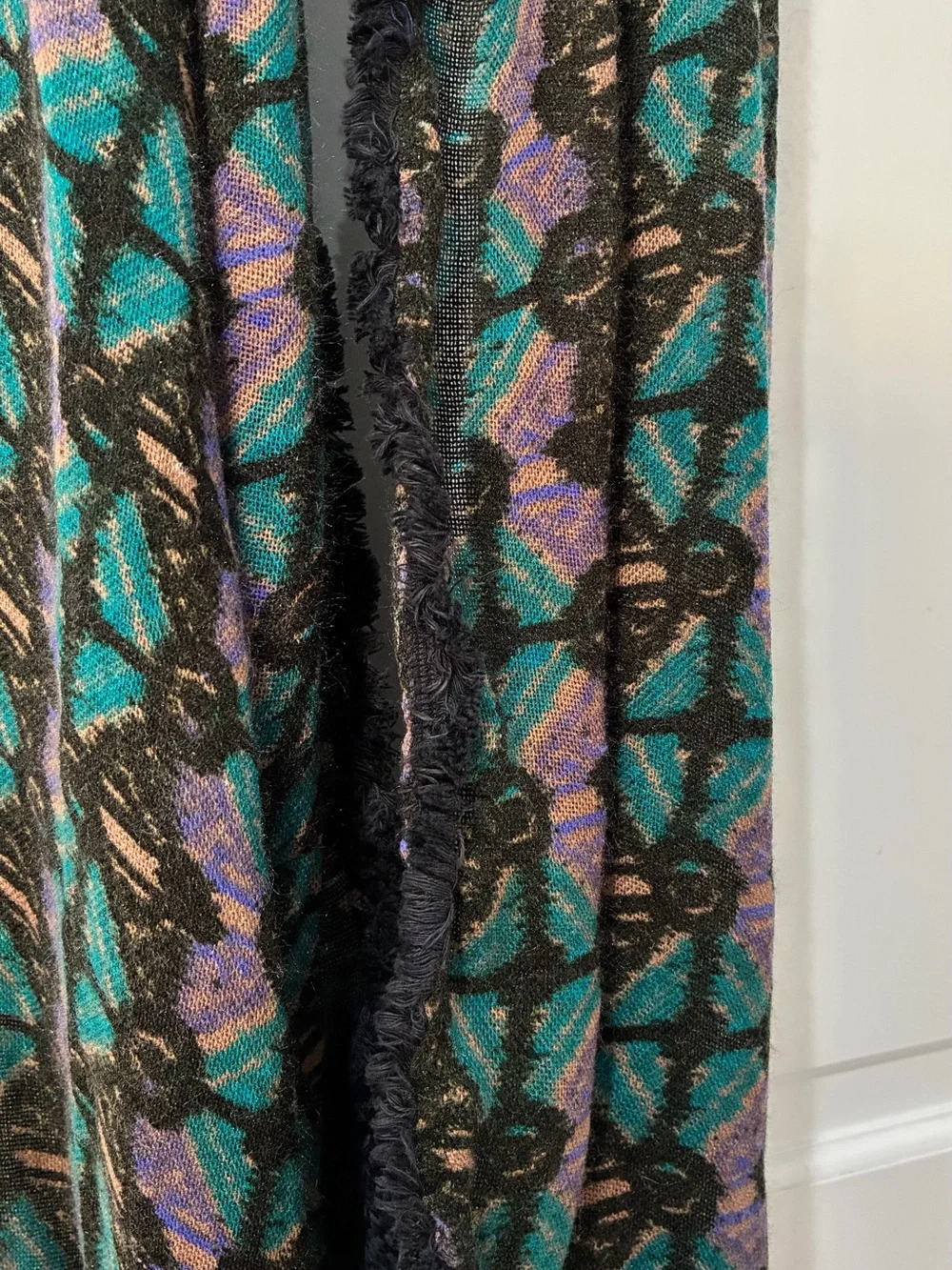 Urban Outfitters Infinity Scarf, with shades of purple, black, and teal.